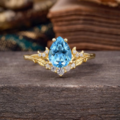 Nature and Moon-Inspired 4-Prong Pear-Cut Aquamarine Engagement Ring
