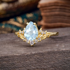 Nature and Moon-Inspired 4-Prong Pear-Cut Aquamarine Engagement Ring