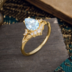 Nature and Moon-Inspired 4-Prong Pear-Cut Aquamarine Engagement Ring