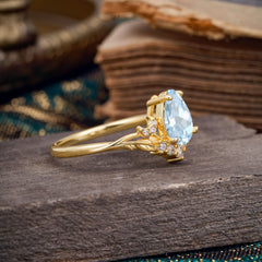 Nature and Moon-Inspired 4-Prong Pear-Cut Aquamarine Engagement Ring