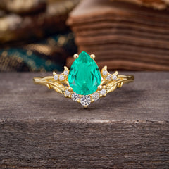 Nature and Moon-Inspired 4-Prong Pear-Cut Emerald Engagement Ring