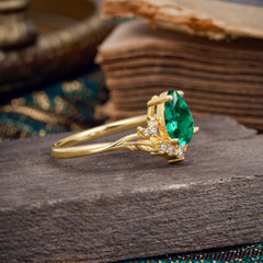 Nature and Moon-Inspired 4-Prong Pear-Cut Emerald Engagement Ring