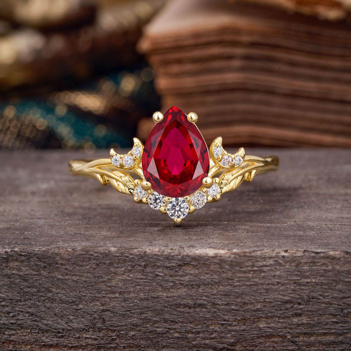 Nature and Moon-Inspired 4-Prong Pear-Cut Ruby Engagement Ring