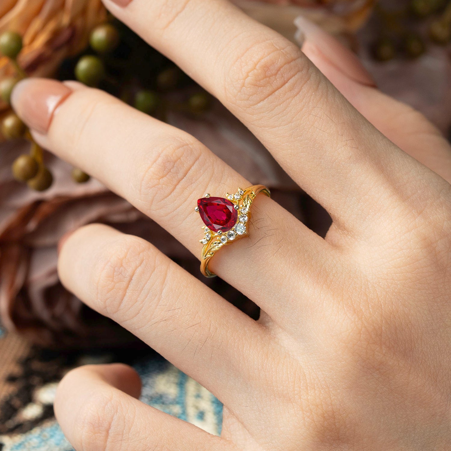 Nature and Moon-Inspired 4-Prong Pear-Cut Ruby Engagement Ring