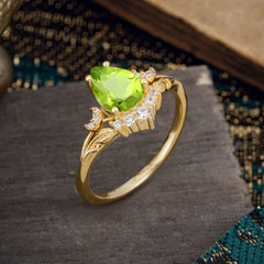 Nature and Moon-Inspired 4-Prong Pear-Cut Natural Peridot Engagement Ring