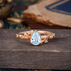Nature-Inspired 3-Prong Pear-Cut Aquamarine Engagement Ring