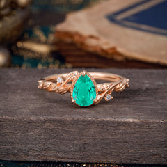 Nature-Inspired 3-Prong Pear-Cut Emerald Engagement Ring