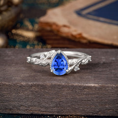 Nature-Inspired 3-Prong Pear-Cut Sapphire Engagement Ring
