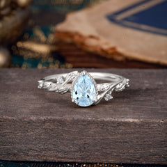 Nature-Inspired 3-Prong Pear-Cut Aquamarine Engagement Ring
