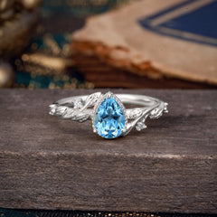 Nature-Inspired 3-Prong Pear-Cut Aquamarine Engagement Ring