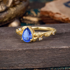 Nature-Inspired 3-Prong Pear-Cut Sapphire Engagement Ring
