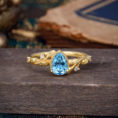 Nature-Inspired 3-Prong Pear-Cut Aquamarine Engagement Ring