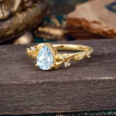 Nature-Inspired 3-Prong Pear-Cut Aquamarine Engagement Ring