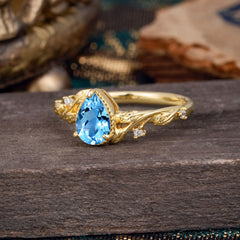 Nature-Inspired 3-Prong Pear-Cut Aquamarine Engagement Ring