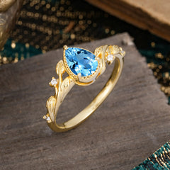 Nature-Inspired 3-Prong Pear-Cut Aquamarine Engagement Ring
