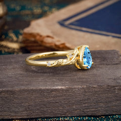 Nature-Inspired 3-Prong Pear-Cut Aquamarine Engagement Ring