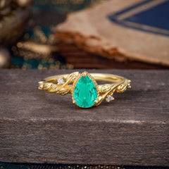 Nature-Inspired 3-Prong Pear-Cut Emerald Engagement Ring