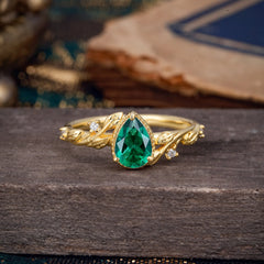 Nature-Inspired 3-Prong Pear-Cut Emerald Engagement Ring
