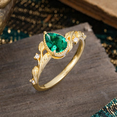 Nature-Inspired 3-Prong Pear-Cut Emerald Engagement Ring