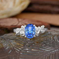 Nature-Inspired 4-Prong Oval-Cut Sapphire Engagement Ring