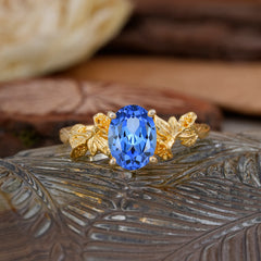 Nature-Inspired 4-Prong Oval-Cut Sapphire Engagement Ring