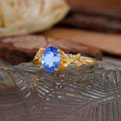 Nature-Inspired 4-Prong Oval-Cut Sapphire Engagement Ring
