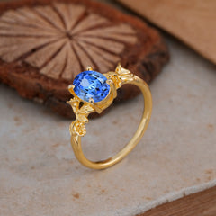 Nature-Inspired 4-Prong Oval-Cut Sapphire Engagement Ring