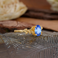 Nature-Inspired 4-Prong Oval-Cut Sapphire Engagement Ring