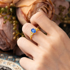 Nature-Inspired 4-Prong Oval-Cut Sapphire Engagement Ring