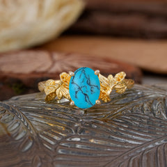 Nature-Inspired 4-Prong Oval-Cut Turquoise Engagement Ring