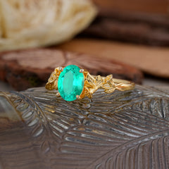Nature-Inspired 4-Prong Oval-Cut Emerald Engagement Ring