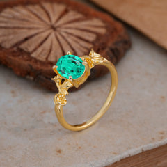 Nature-Inspired 4-Prong Oval-Cut Emerald Engagement Ring