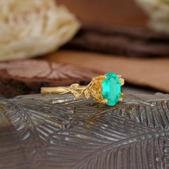 Nature-Inspired 4-Prong Oval-Cut Emerald Engagement Ring