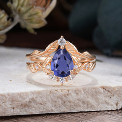 Nature-Inspired 3-Prong Tear-Cut Tanzanite Engagement Ring Set
