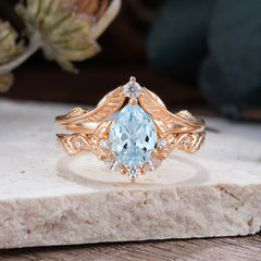 Nature-Inspired 3-Prong Tear-Cut Aquamarine Engagement Ring Set