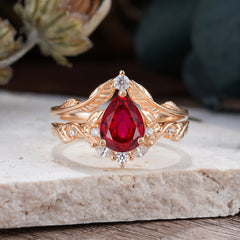 Nature-Inspired 3-Prong Tear-Cut Ruby Engagement Ring Set