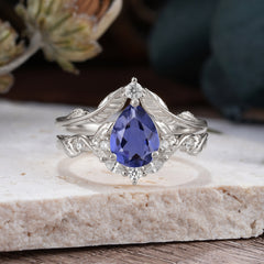 Nature-Inspired 3-Prong Tear-Cut Tanzanite Engagement Ring Set