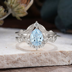 Nature-Inspired 3-Prong Tear-Cut Aquamarine Engagement Ring Set