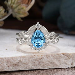 Nature-Inspired 3-Prong Tear-Cut Aquamarine Engagement Ring Set