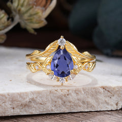 Nature-Inspired 3-Prong Tear-Cut Tanzanite Engagement Ring Set