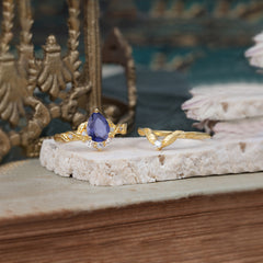 Nature-Inspired 3-Prong Tear-Cut Tanzanite Engagement Ring Set