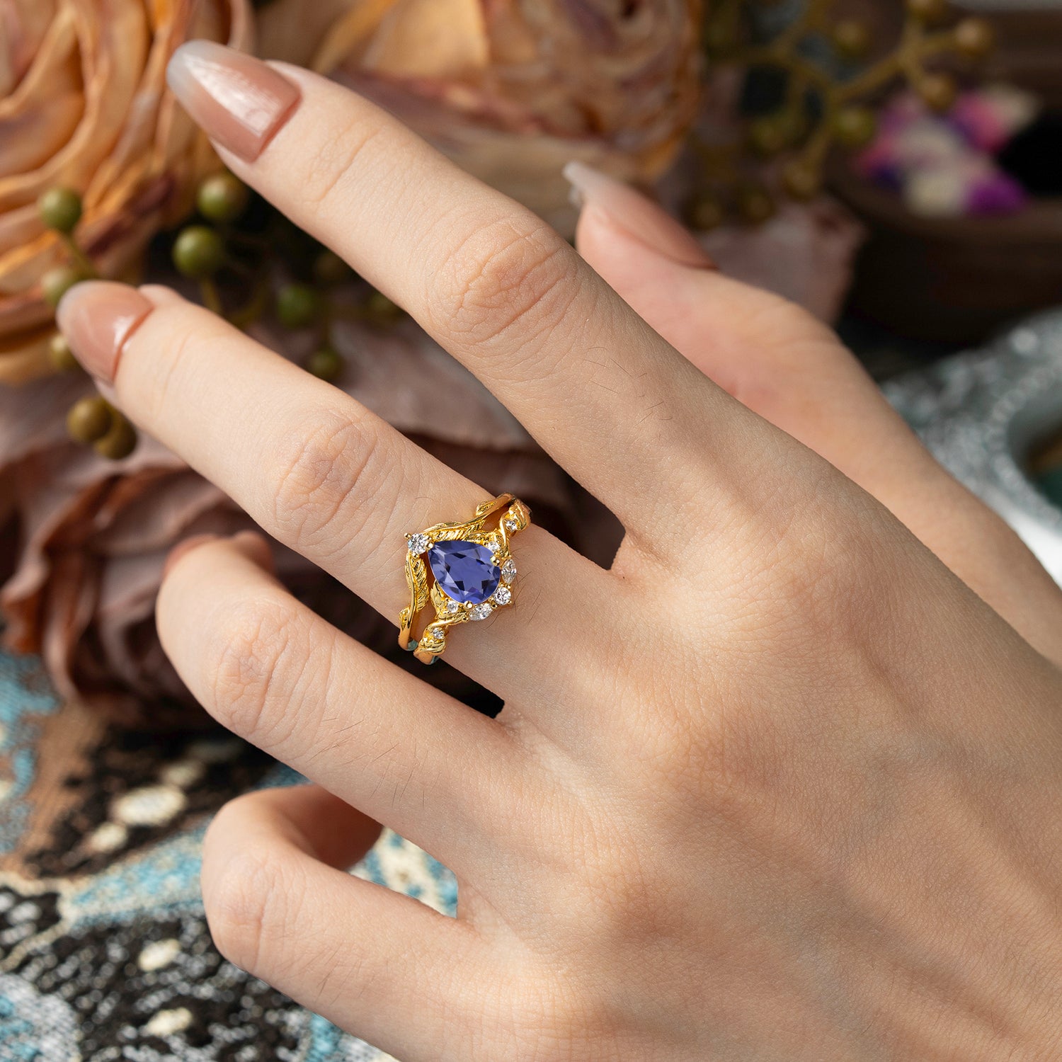 Nature-Inspired 3-Prong Pear-Cut Tanzanite Engagement Ring Set