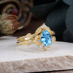 Nature-Inspired 3-Prong Tear-Cut Aquamarine Engagement Ring Set