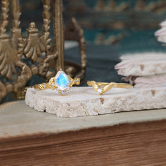 Nature-Inspired 3-Prong Tear-Cut Moonstone Engagement Ring Set