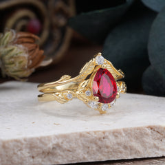 Nature-Inspired 3-Prong Tear-Cut Ruby Engagement Ring Set