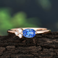 2 Prong Sapphire Oval Cut Ring with Sparkly Side Stones for Her