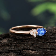2 Prong Sapphire Oval Cut Ring with Sparkly Side Stones for Her