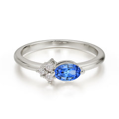 2 Prong Sapphire Oval Cut Ring with Sparkly Side Stones for Her