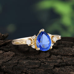 3 Prong Unique Pear Cut Sapphire Cluster Engagement Ring