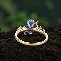 Nature-Inspired Leafy Branch 4-Prong Marquise Sapphire Engagement Ring